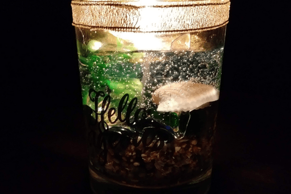 gel candle glowing at night