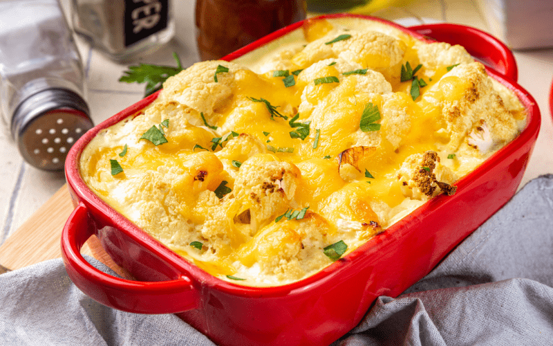 Valentine's Day recipe in a red dish cheesy potatoes