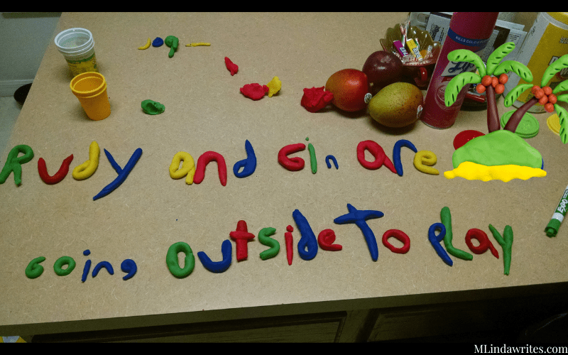 clay art ideas playdough letters in red, blue, green and yellow