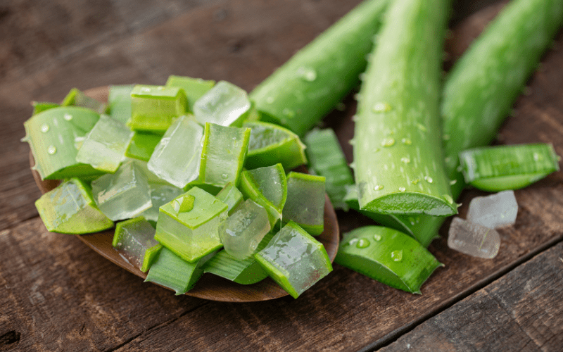 aloe vera for skin diced up in little cubes with the aloe still coated with the green shell