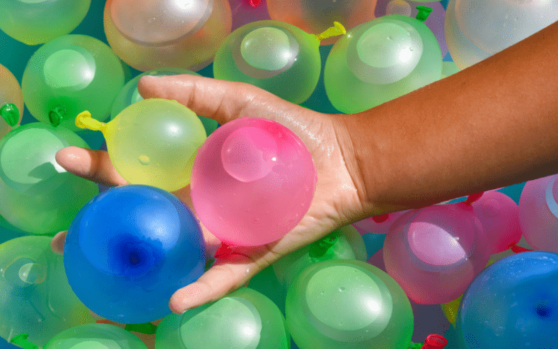 water balloons in someones hands
