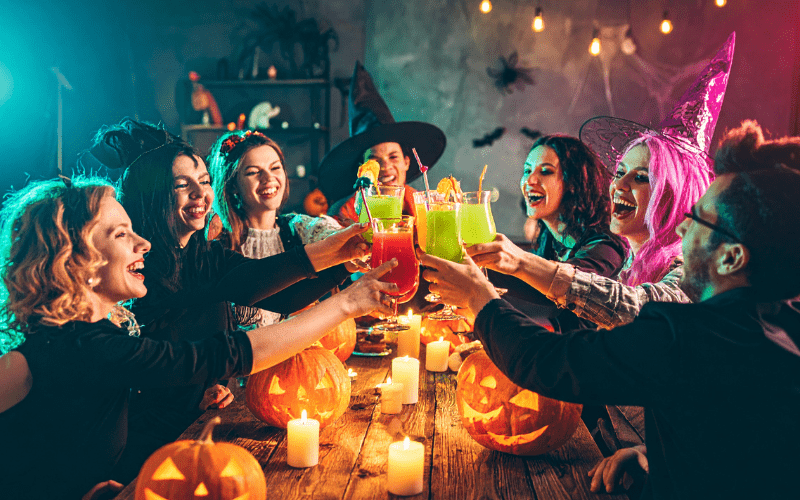 Halloween party ideas witches and warlocks sharing drinks