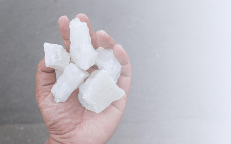 alum powder in shape of Crystals in someone's hand