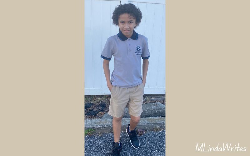weight gain journey for Anthony who is standing in his school uniform smiling.